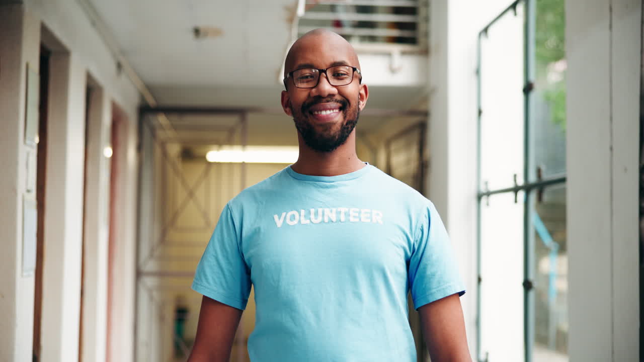 Man wearing a volunteer shirt