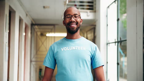 man wearing a volunteer shirt
