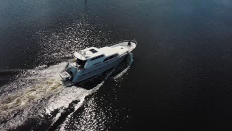 luxurious white yacht sailing on water