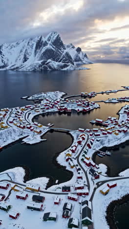 aerial view of snowy fishing village in lofoten, norway