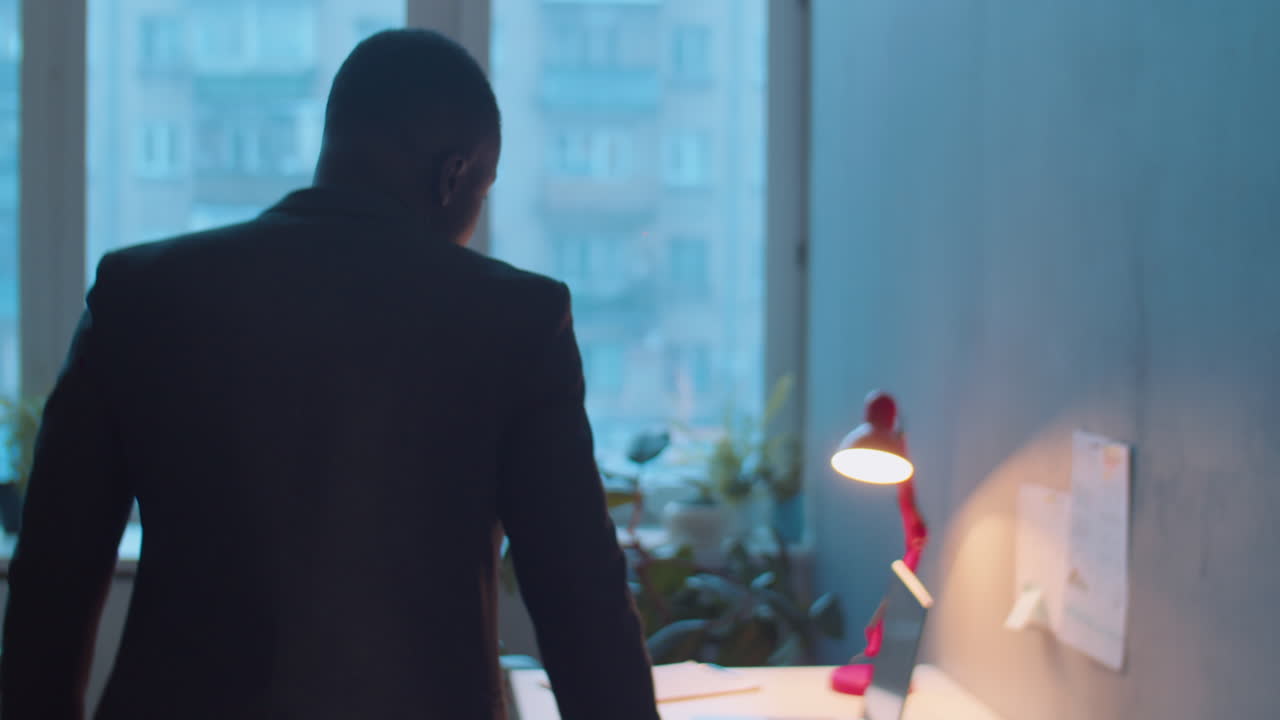 African American Businessman Going to Workplace in Office