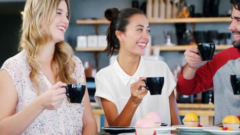 Friends-having-breakfast-in-restaurant