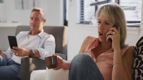 Couple-using-technology-at-home