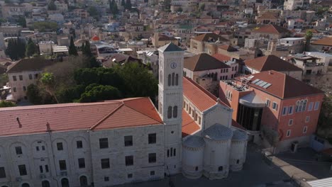 Aerial-orbits-ancient-Convento-Francescano-in-old-town-Nazareth,-ISR
