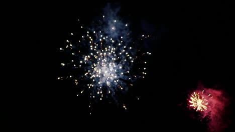 gold fireworks in slow motion on night sky blur