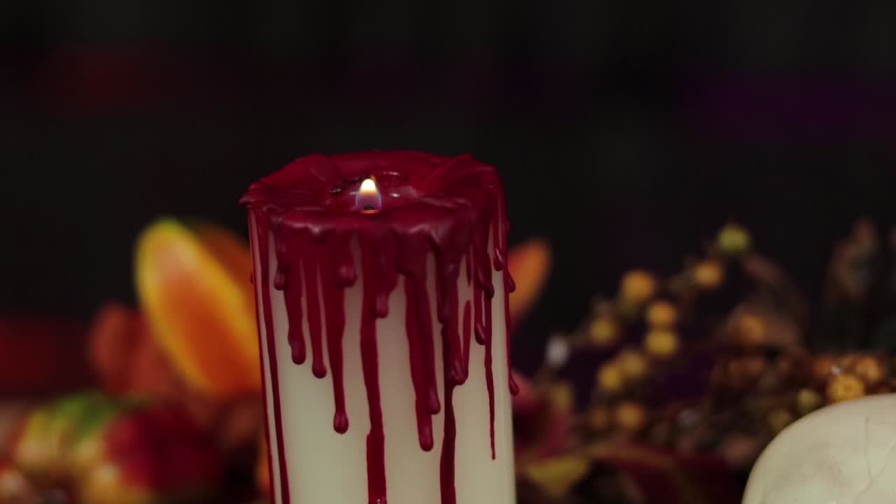 Bloody candle. Autumn decorations, (zoom).