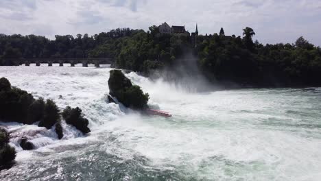 rhine falls at neuhausen, switzerland - aerial drone view of the largest waterfall in europe