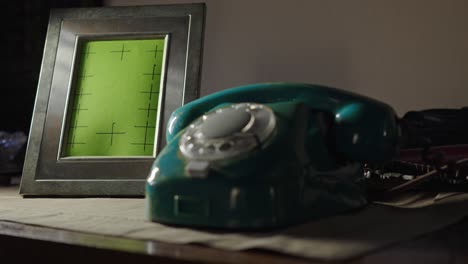 retro telephone and blank mockup family photo frame in home scene slide shot