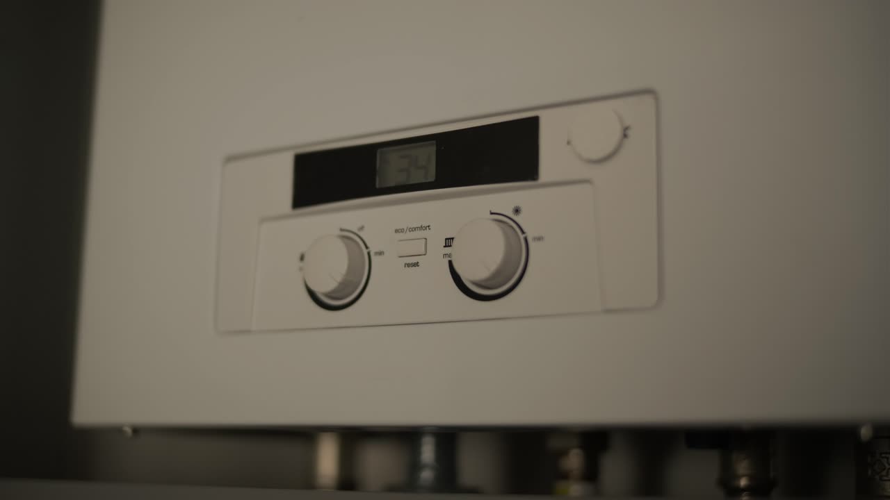 Close-up of a Gas Boiler Control Panel Showing Temperature