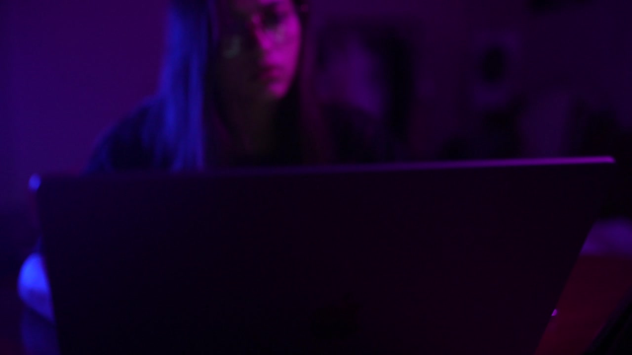 Woman in Purple and Pink Light