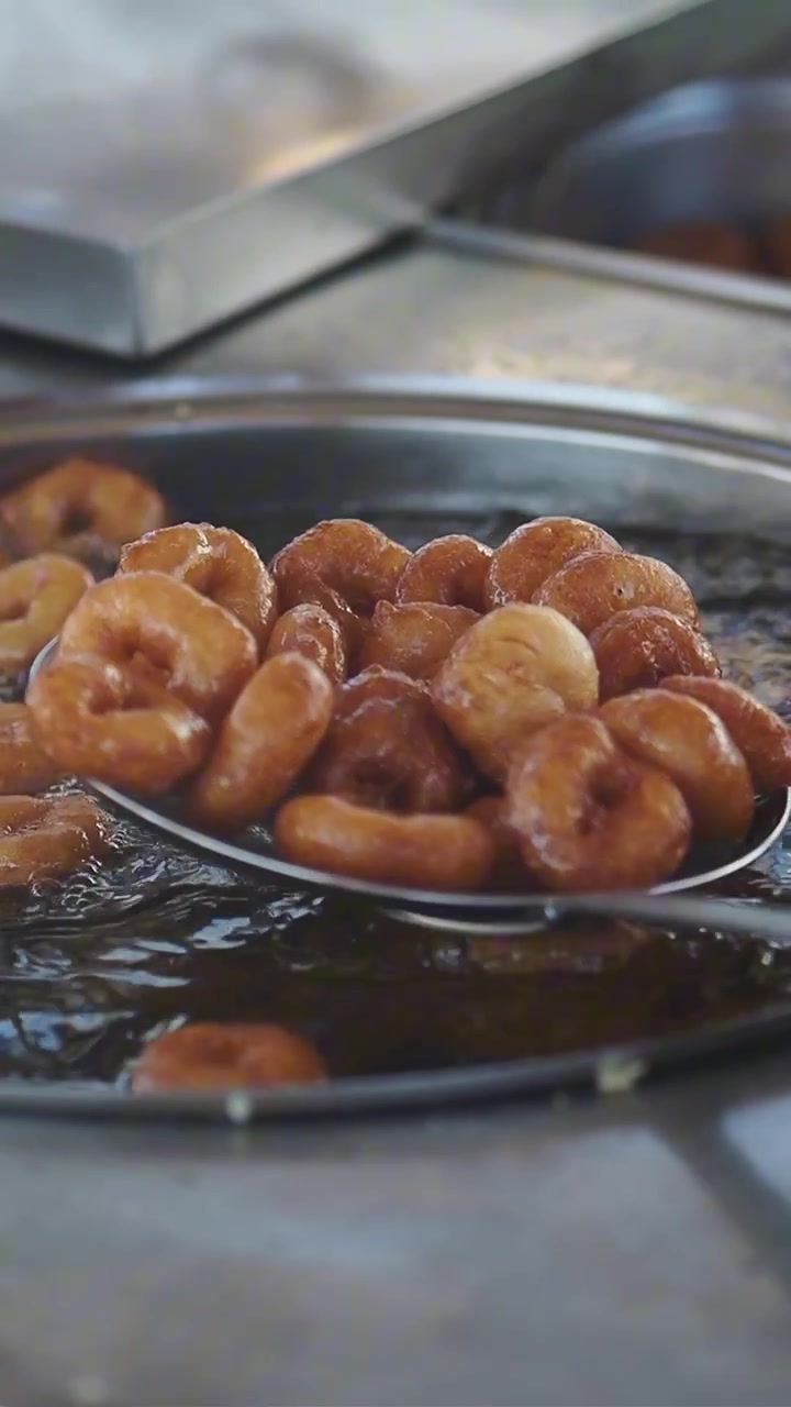 Golden Brown Lokma Donuts Deep Frying in Hot Oil