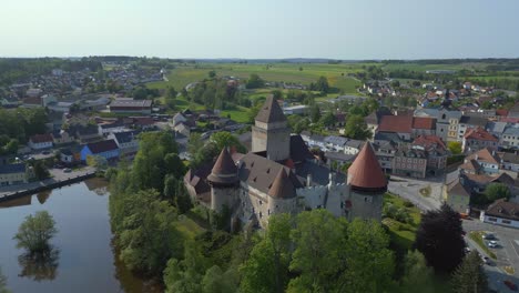 Marvelous-aerial-top-view-flight-Austria-Heidenreichstein-castle-in-Europe,-summer-of-2023