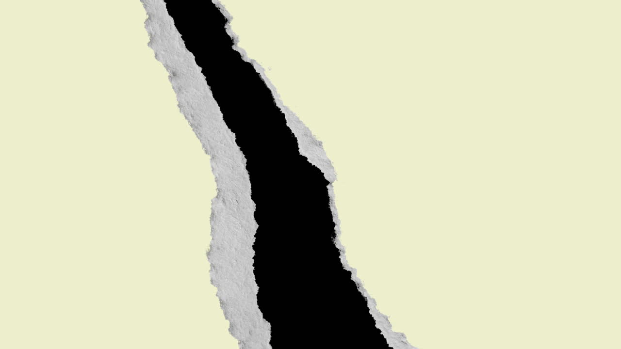 Light Yellow Paper Tearing Vertically to Reveal Black Background