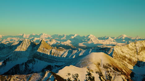 sunset over rocky mountain summits during autumn in fribourg alps near charmey, western switzerland