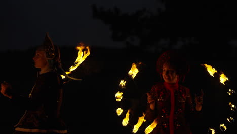 fire dancers in traditional costumes