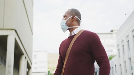 African-american-man-on-the-go-wearing-coronavirus-covid19-mask