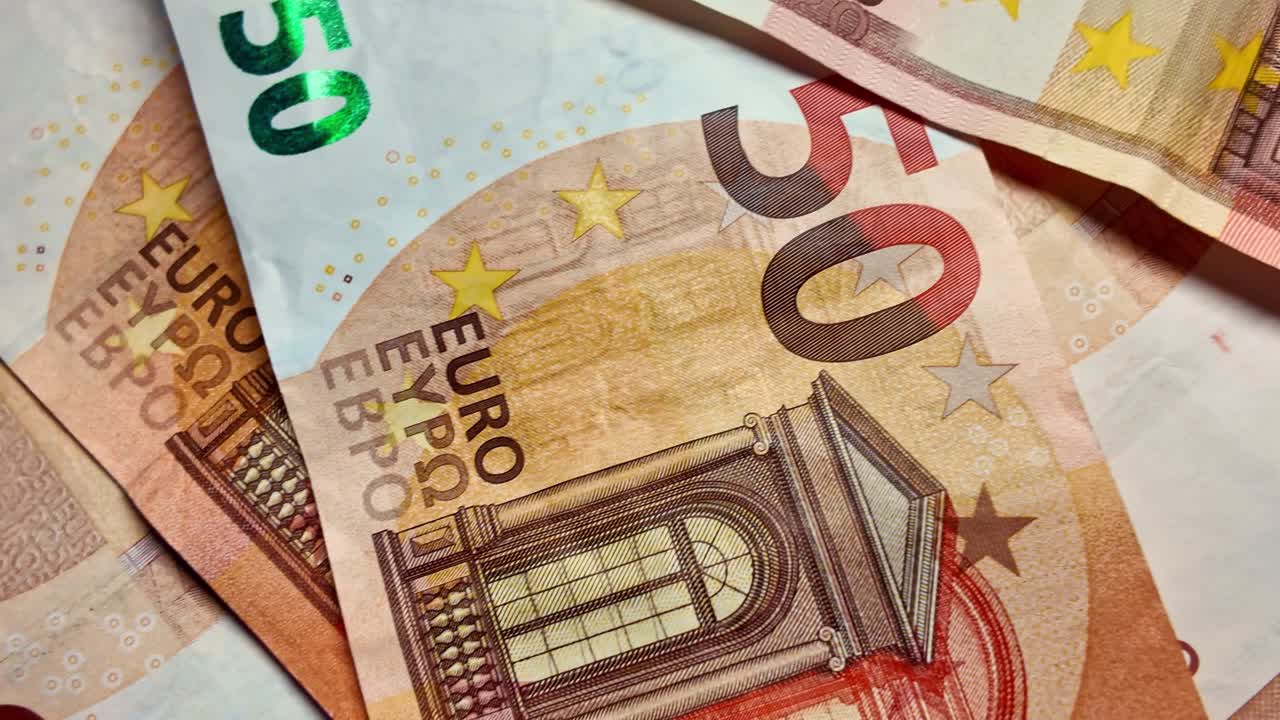 Close-up macro shot of 50 Euro banknotes, finance, economy, and business content, European currency and cash money concept
