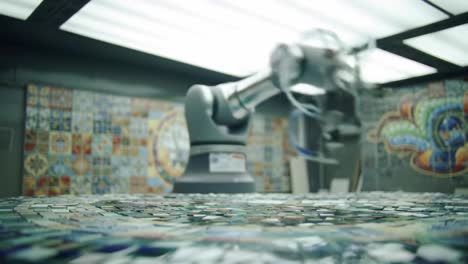 a robotic arm skillfully assembles a colorful mosaic in an innovative workshop filled with intricate tile designs and artistic patterns, reflecting modern craftsmanship