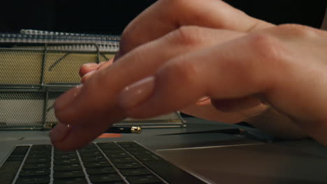 Closeup woman fingers typing laptop at home. Student hands pressing keyboard