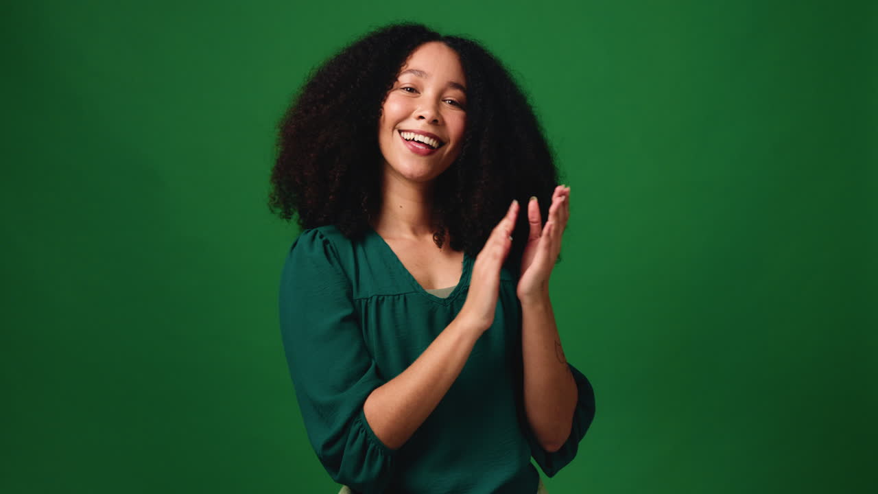 Woman Clapping on Green Background