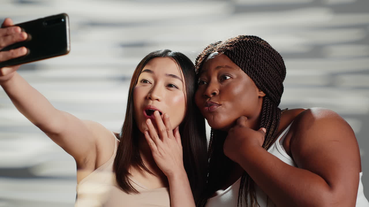 Diverse Friends Taking Selfies Together