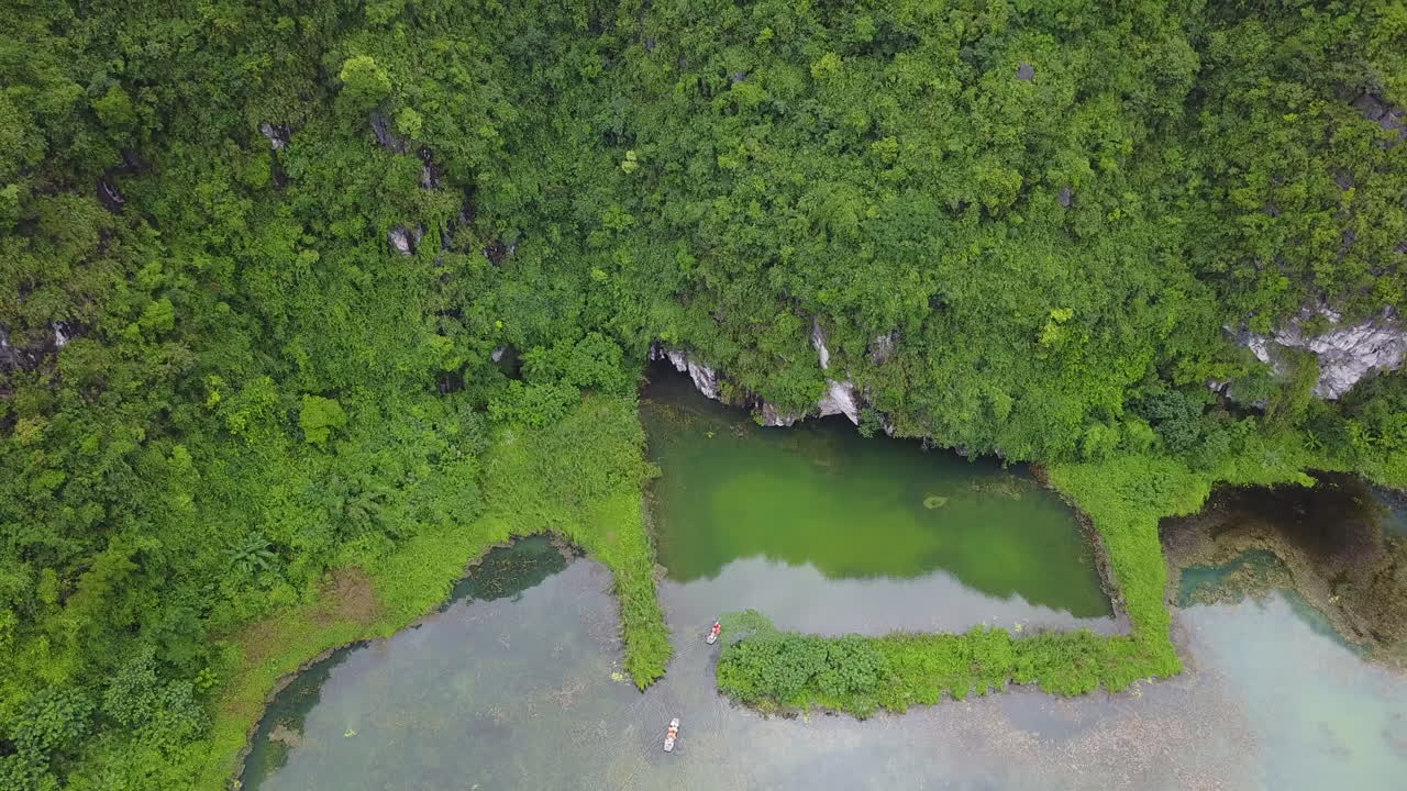Explore the breathtaking beauty of Ninh Binh, Vietnam with a boat tour through stunning limestone karsts and lush greenery. Discover serene rivers and unique landscapes.