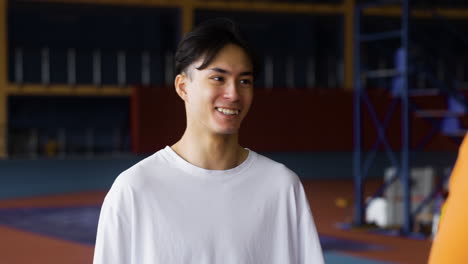 young man talking in the gym