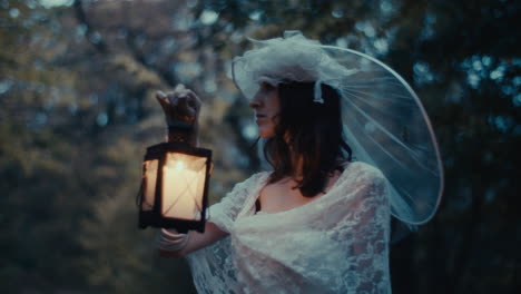 woman in a white dress and veil holding a lantern in a mysterious forest