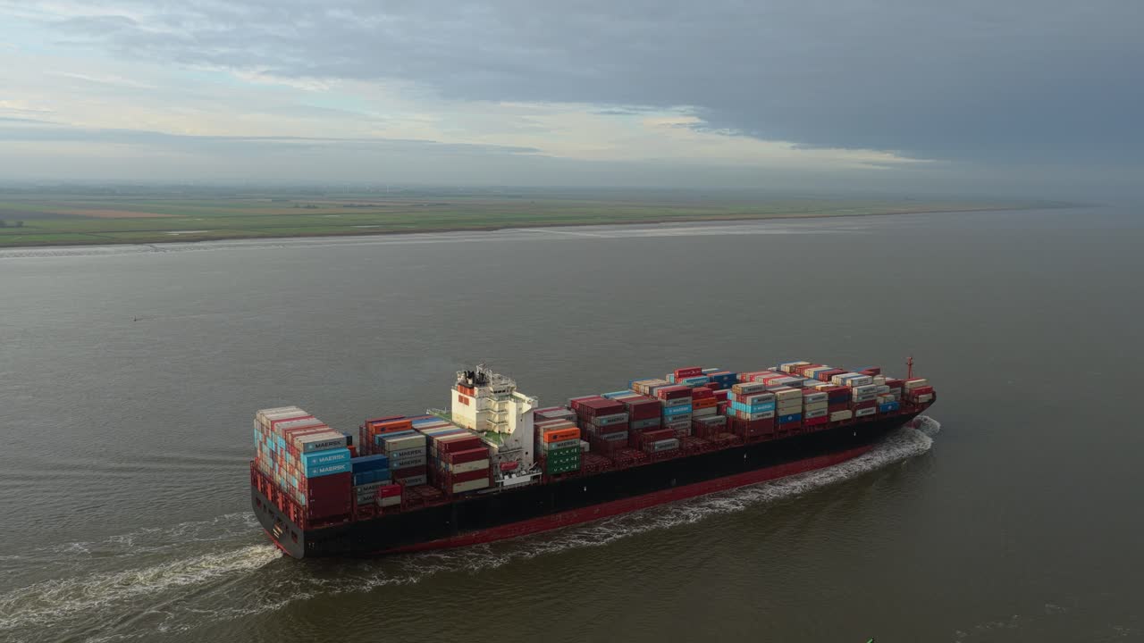 Commercial vessel on Elbe River, drone footage of shipping in Germany