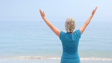 Woman-facing-the-sun-with-open-arms