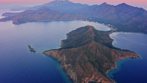 drone flight above mountainous coastline of datça peninsula at dawn