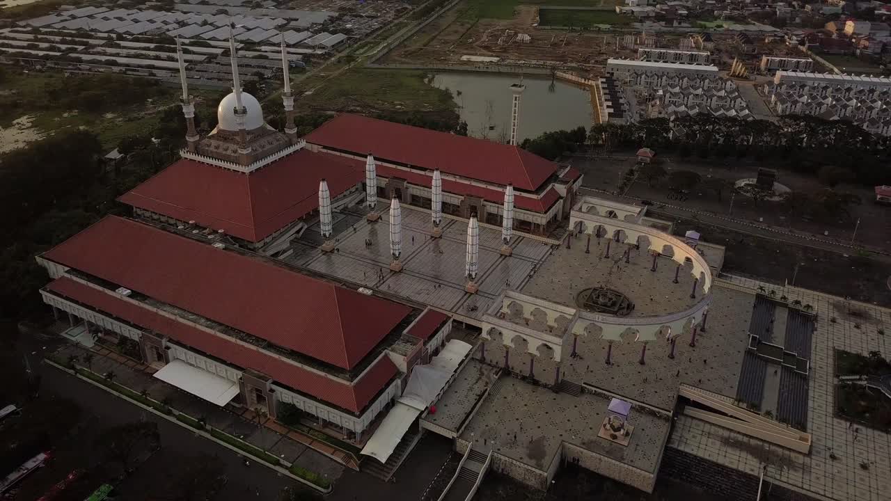 Aerial view of the great Mosque of Central Java (MAJT) in suset time. Th sun is orange and the weather is cloudy. Masjid Agung Jawa Tengah the one of the icon of Semarang City
