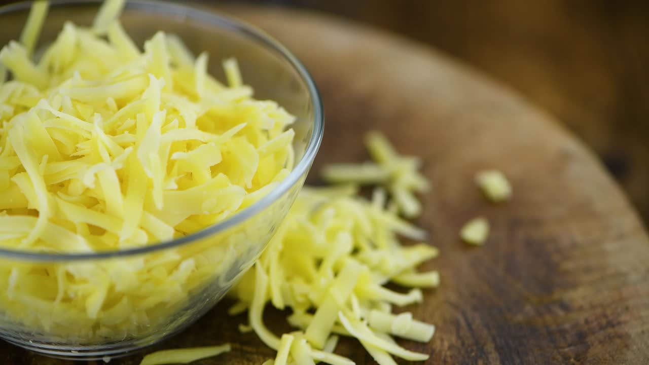 Formaggio grattugiato in loop continuo senza soluzione di continuità