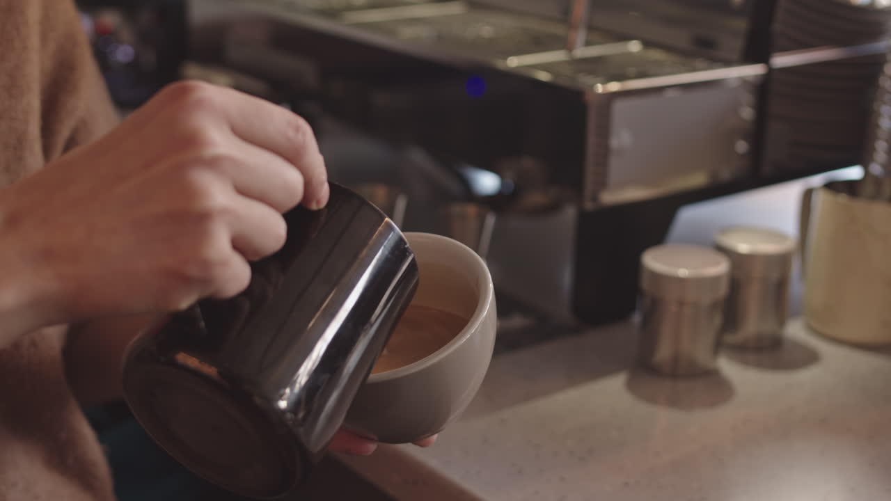 Unrecognizable Bartender Making Cappuccino in Coffeeshop