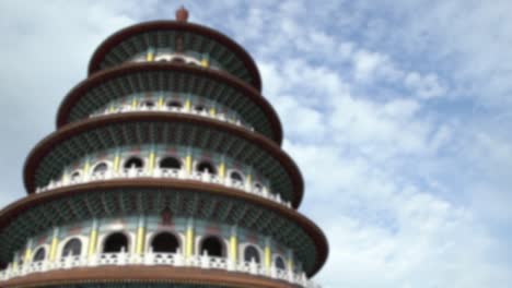 blurred defocused tian yuan temple in tamsui. tall pagoda temple of heavens