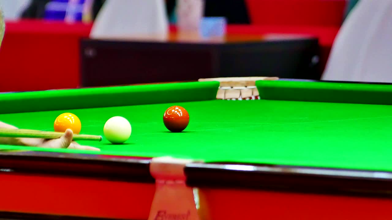 Close up of Snooker shooting on snooker table. Game of snooker.