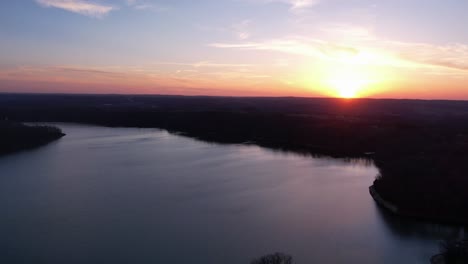 aerial time lapse of clouds flying over lake monroe in indiana