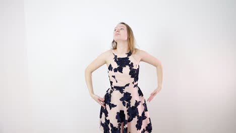 witness the slow motion dance performance of a thoughtful performer in a white room