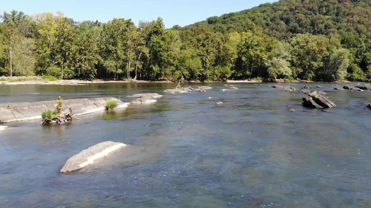 Potomac River in summer low aerial over rocks