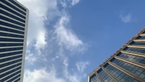 time lapse of clouds moving over downtown district