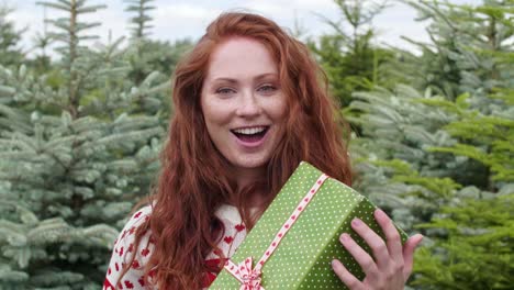 woman catching a christmas present