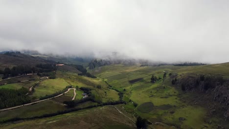 green terrain of the hills under white cloudy sky in cumbemayo in peru