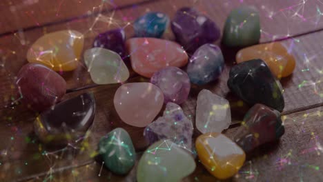 animation of shapes and light spots over colourful stones