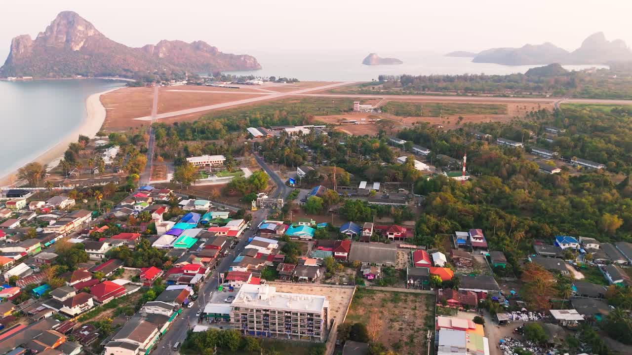 Prachuap Khiri Khan village marine coastline town Thailand aerial drone at sunset