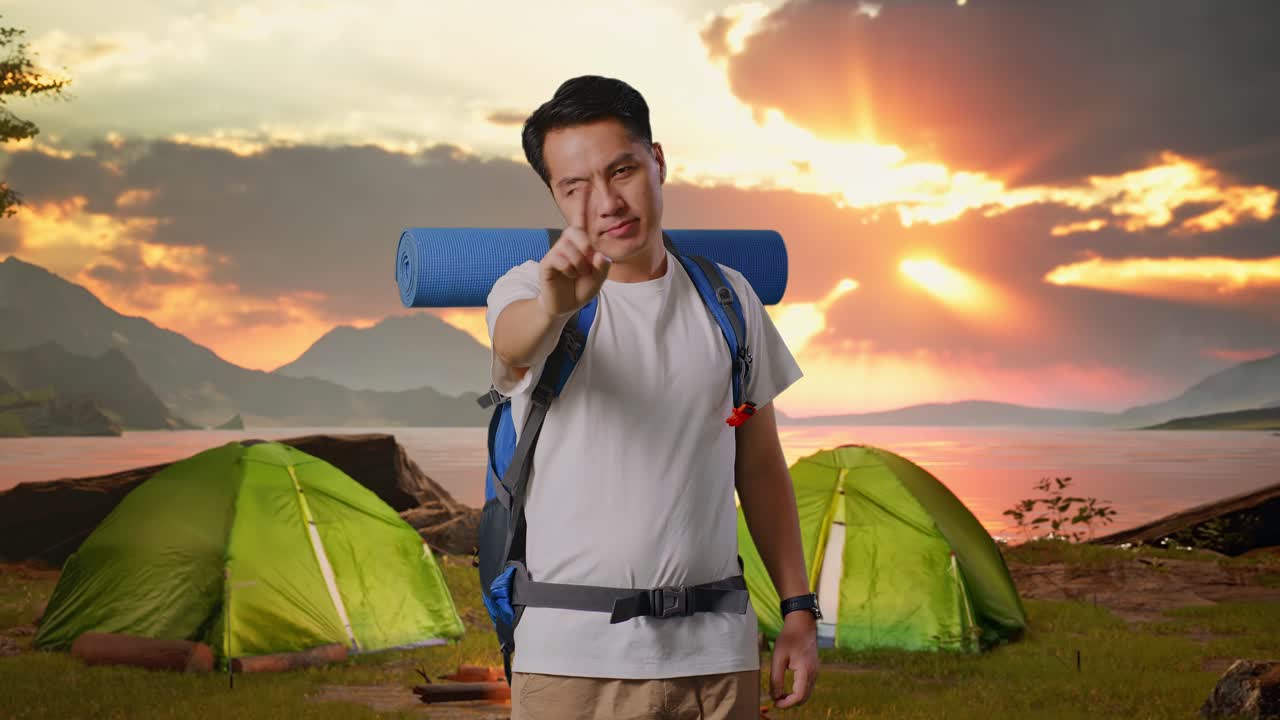 Man Hiking in Nature Pointing Disapprovingly