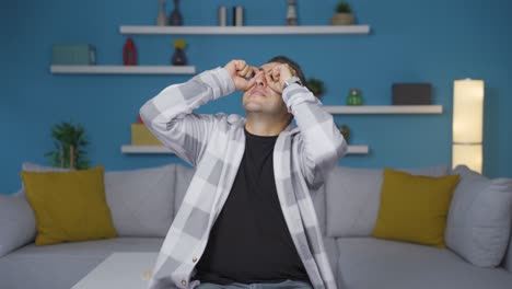 man with binoculars looking away.