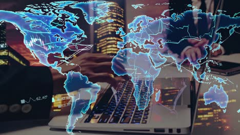high-angle shot of hands typing on a laptop with a transparent world map overlay video