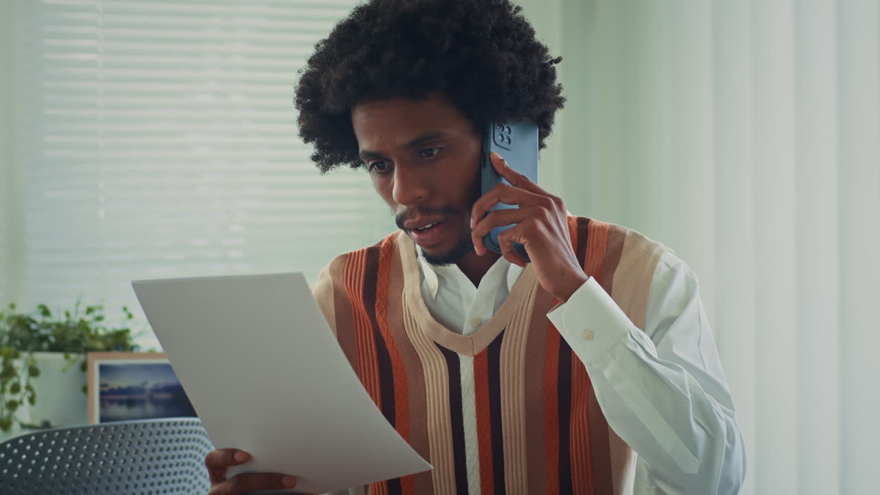 Black Male Lawyer Agreeing Terms of Contract on Smartphone at Office