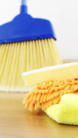 various housekeeping supplies in a bucket