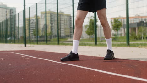 man feet in sneakers